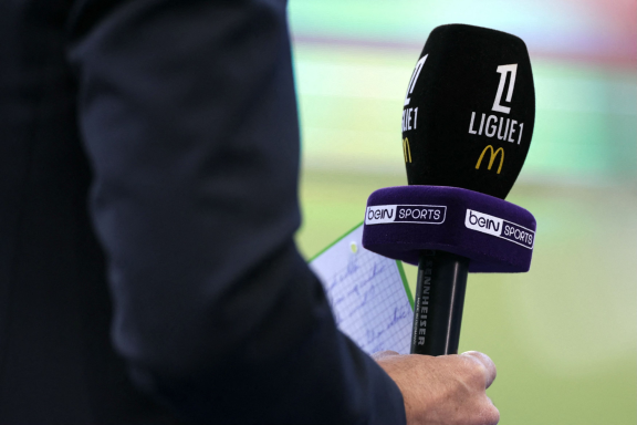 Un journaliste de BeIn Sports en marge d'un match de Ligue 1 (photo Roméo Boetzle/AFP).