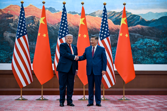 Donald Trump et Xi Jinping à Pékin le 14 mai 2026 (photo Kenny Holston/AFP).