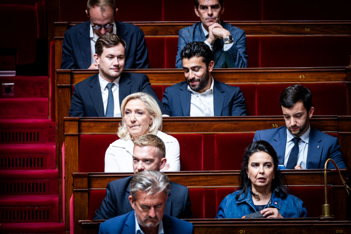 Marine Le Pen et des députés du groupe Rassemblement national, en juillet 2026, à l'Assemblée (photo Xose Bouzas/Hans Lucas/AFP).
