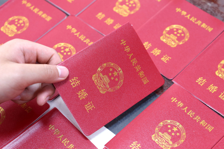 Papiers d'identité en Chine. Photo by Hu gaolei / Imaginechina / Imaginechina via AFP