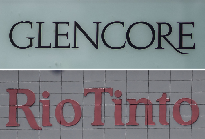 Rio Tinto et Glencore ont annoncé la reprise de discussions préliminaires (Photo by Fabrice COFFRINI and Saeed KHAN / AFP)
