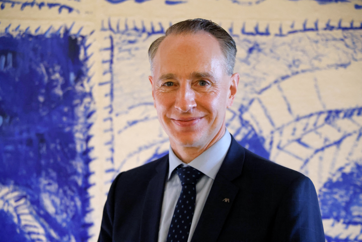 Thomas Buberl, le directeur général d'Axa - Photo by Ludovic MARIN / AFP