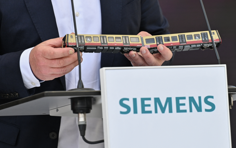 Siemens (Photo by RALF HIRSCHBERGER / AFP)