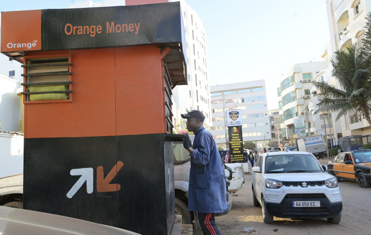 Orange Money. Photo by SEYLLOU / AFP