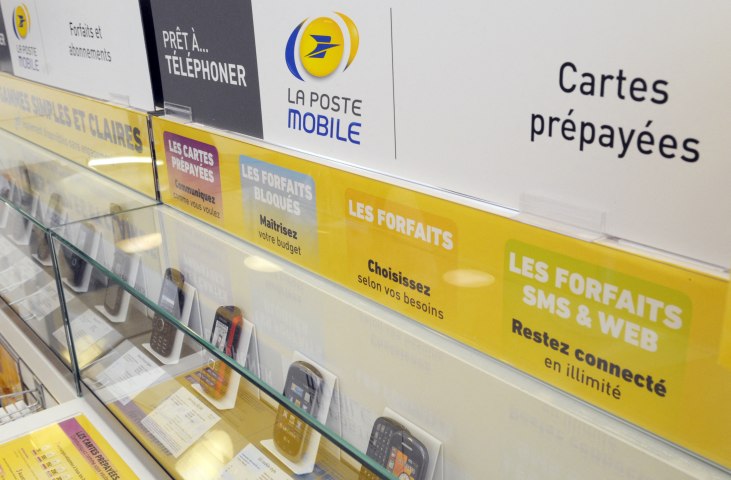 La Poste Mobile  (Photo by ERIC PIERMONT / AFP)