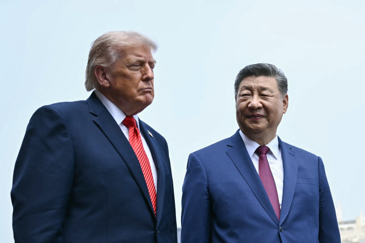 Donald Trump, président des Etats-Unis et Xi Jinping, Président de la République populaire de Chine - Photo par BRENDAN SMIALOWSKI / POOL / AFP