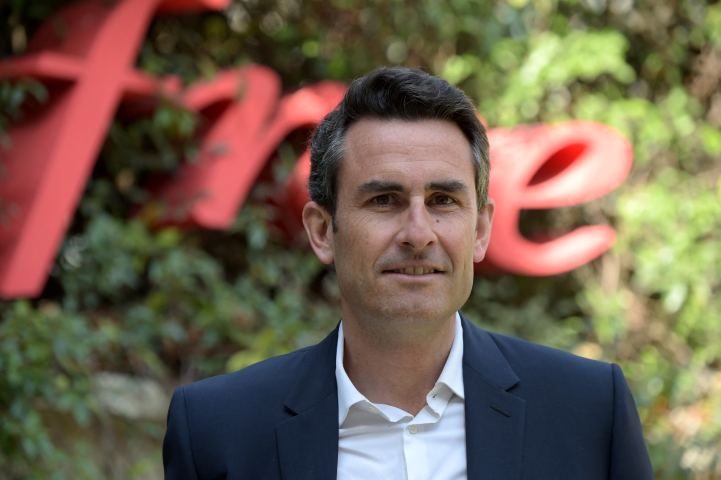 Thomas Reynaud, le directeur général d'Iliad - Photo by Eric PIERMONT / AFP