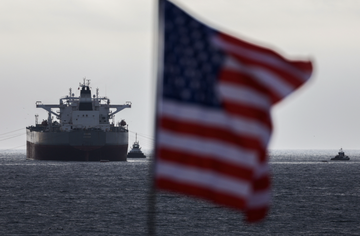 Drapeau américain. Photo par PATRICK T. FALLON / AFP