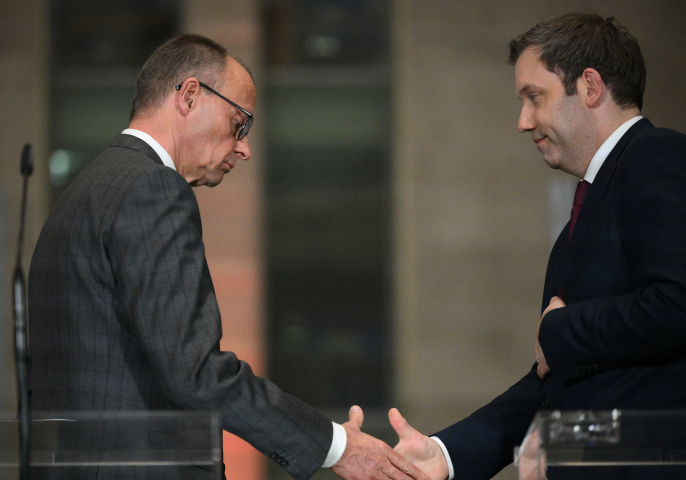 Friedrich Merz, président de la CDU et Lars Klingbeil, président du SPD - RALF HIRSCHBERGER / AFP