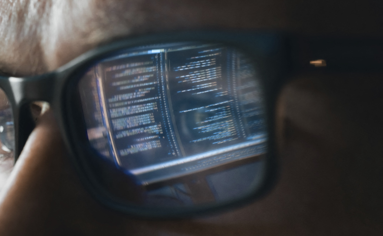 Software engineer working on code reflecting in glasses. (Photo by GORODENKOFF PRODUCTIONS/SCIENCE / GPR / Science Photo Library via AFP)
ILLUS
