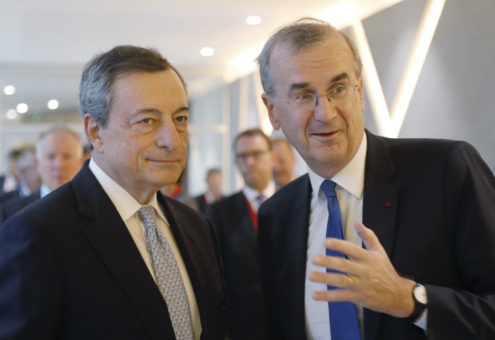 Mario Draghi et François Villeroy de Galhau, gouverneur de la Banque de France - FRANCOIS GUILLOT / AFP
