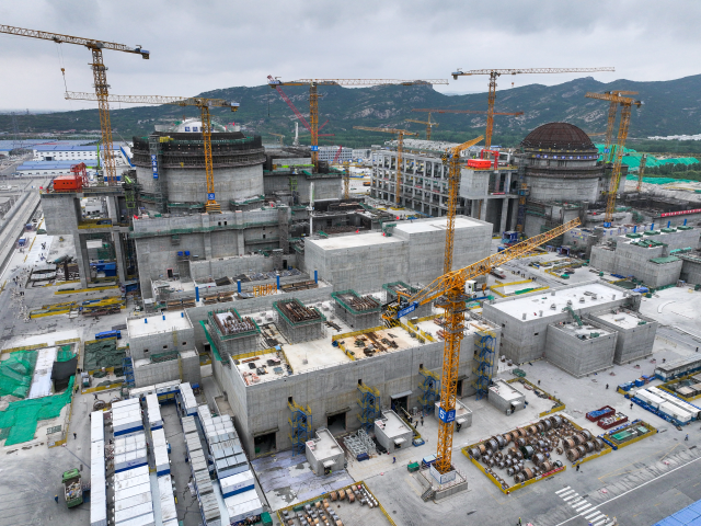 Construction d'une centrale nucléaire en Chine. Photo by Li Bo / XINHUA / Xinhua via AFP